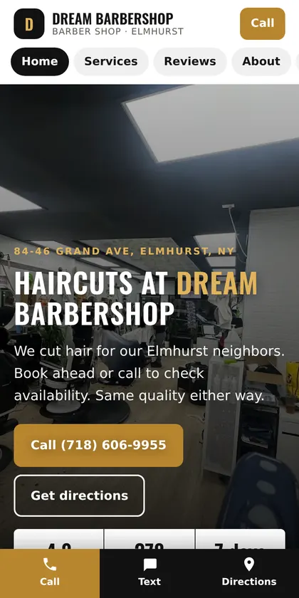 DREAM Barbershop website on a phone